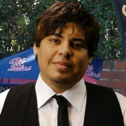 Young man with shaggy dark hair